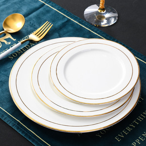 Plats occidentaux en céramique blanche pour une utilisation dans un restaurant d'hôtel sous une assiette - Product Image 1
