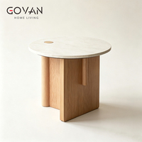 Table basse en bois massif de style nordique avec plateau en travertin, idéale pour les zones d'accueil à domicile et les hôtels