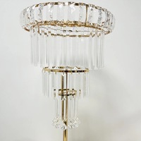 Support de fleurs de luxe en métal doré pour banquet, centre de table de mariage avec pendentif en cristal pour la décoration