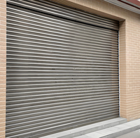 Installez les portes de volet roulant de style perforé, portes enroulées en acier de couleur électrique
