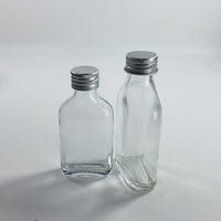 Botol anggur datar bening 50ml 100ml 200mlClear, botol kaca jus dengan tutup Aluminium, botol Pet Grade makanan dapat dipakai ulang