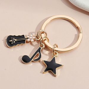 Nouveau produit phare : Pendentif de sac porte-clés en forme de disque musical, phonographe, clavier, écouteurs, microphone, piano, violon, batterie - Product Image 3
