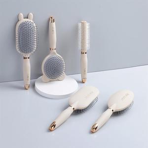 Brosse à cheveux élégante bleue avec coussin d'air, en ABS, nylon et caoutchouc, avec nettoyeur - Product Image 2