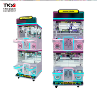 Mini-jouet en peluche pour enfants 4 personnes Grue de centre commercial Machine d'amusement à pièces avec armoire en métal Grue à griffes