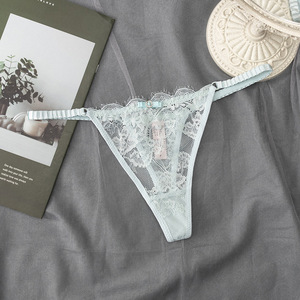 Tanga de encaje floral transparente para mujer con lazo, tirantes finos, tiro bajo, sexy, lencería transpirable, venta al por mayor - Product Image 1