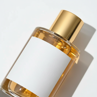 Pulvérisateur de parfum rond en verre rechargeable à brume fine avec capuchon doré 30ml/50ml/100ml OEM/ODM pour emballage de parfum