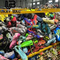 Chaussures d'occasion S25 en gros, chaussures de marque d'occasion, chaussures de football internationales, chaussures de seconde main de qualité supérieure