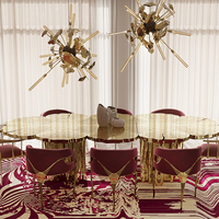Table à manger contemporaine en laiton doré, design unique, tables à manger italiennes de luxe modernes pour espaces prestigieux