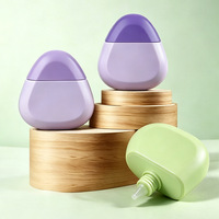 Nouvelle bouteille souple vide de 50 ml en PE, style galet triangulaire, imprimée, pour crème pour les mains, crème pour le visage et shampoing, modèle 2026