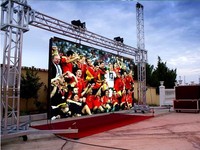 Système de mur vidéo LED clé en main P2.6, pack de transport, écran de location incurvé pour stand d'exposition, écran de fond de scène, centre commercial