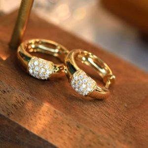 Boucles d'oreilles créoles Xinfly en or 18 carats avec diamant naturel taille brillant 0,18 carat en or jaune - Product Image 4