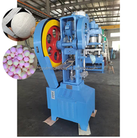 Machine de moulage pour bombes de bain moussantes hydrauliques et bombes de bain vapeur