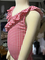 Traje de baño de una pieza con tirantes cruzados y volantes para niñas al por mayor, traje de baño de una pieza con cuello de volantes de guinga rojo certificado 50 +