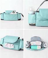 Magnifique sac organisateur pour poussette, facile à installer, avec porte-gobelet
