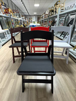 Chaise de salle à manger pliable en résine plastique, capacité de charge élevée, empilable et portable pour la location d'hôtels et de salles de réception