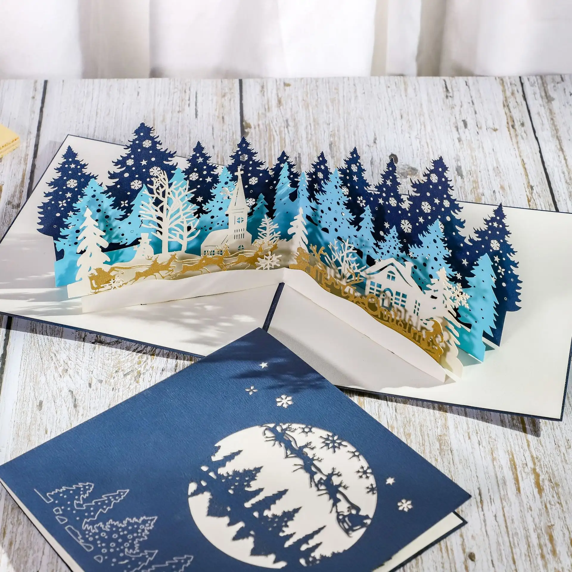 ขายส่งเมอร์รี่คริสต์มาสการ์ดออกแบบใหม่พรรคบัตรเชิญซองจดหมายป่ากวางรูปแบบร้อนขายป๊อปอัพการ์ดอวยพร