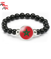 Ensemble populaire en promotion pour les événements sportifs de mars 2026 : Bracelet, porte-clés, sac souvenir, chapeau, écharpe, maillot de football, drapeau du Maroc
