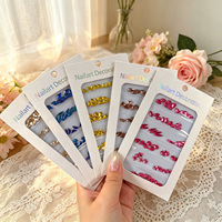 CY Großhandel 3D Nagelkunst-Dekorationsset Mehrformige Flache Edelsteine Papierverpackte Strass-Steine für Professionelle Maniküre-Salons
