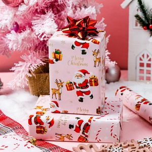 Pink Christmas <b>Wrapping</b> <b>Paper</b> Roll 17 Inch X 33 Feet Reversible Santa Deer Candy Cane Design Gift Craft Packaging - Product Image 6