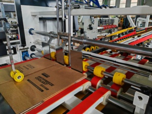 Máquina de embalaje de cartón corrugado de alta calidad Máquina de costura y encolado plegable de cajas de cartón - Product Image 4