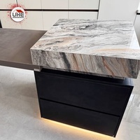 Îlot de cuisine en pierre frittée avec table extensible Appareils électriques personnalisés Armoires pour évier à eau Table à manger minimaliste