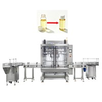 Machine de remplissage de bouteilles pour huiles de tournesol, d'olive, végétales, de poisson, de palme et de parfum, et pour cartouches de cuisson et d'emballage