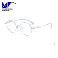 Monture de prescription ronde en titane sur mesure OEM, anti-lumière bleue, pour enfants et adolescents, taille 47-17-142, fabricant professionnel
