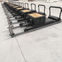 Machine de Pilates Reformer en aluminium durable, pliable, pour usage domestique, avec cadre noir, design compact et portable pour studio de Pilates