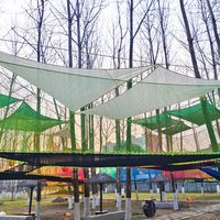 Structure d'escalade géante Ropecube en filet arc-en-ciel multi-niveaux, aire de jeux en corde crochetée, équipement intérieur pour centre de divertissement familial