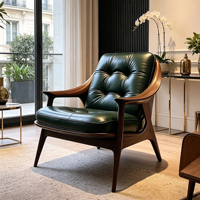 Fauteuil lounge individuel en fibre de verre à grain de noyer, cuir capitonné vert foncé, pour un espace de vie rétro haut de gamme