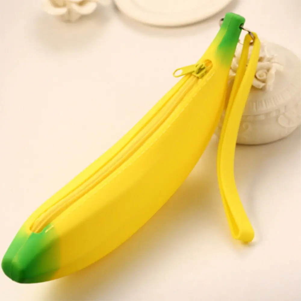 Promotion personnalisé banane forme Silicone caoutchouc changement sac à main porte-monnaie porte-crayon multi fonction stylo sac pour enfants