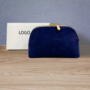 La fábrica vende al por mayor bolsas de cosméticos de textura suave, gran capacidad y alta calidad en color azul. - Product Image 1