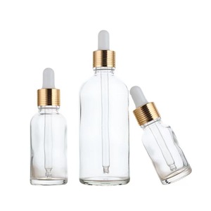 Flaconi Contagocce in <span class=keywords><strong>Vetro</strong></span> <span class=keywords><strong>Trasparente</strong></span> di Lusso da 50ml all'Ingrosso, Logo Personalizzato per Oli Essenziali Cosmetici, Confezione <span class=keywords><strong>Trasparente</strong></span> in Scatola - Product Image 1