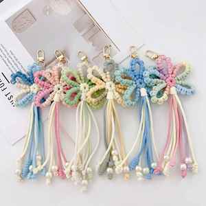Porte-clés en tissu tressé fait main avec pompon floral, style rustique, pendentif de sac et cordon pour clés de voiture, décoration bohème créative - Product Image 1