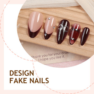 24 faux ongles rouges de festival, style French Press, en forme d'amande, avec nœud papillon argenté, réutilisables, prêts à poser, pour les fêtes - Product Image 3