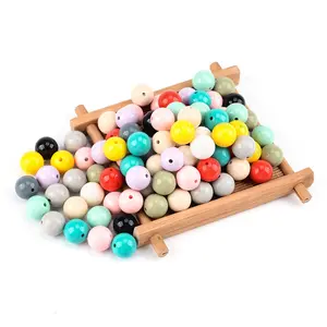2023 heißer Verkauf Bulk benutzer definierte Süßigkeiten Farben rund Holz Lebensmittel qualität DIY Baby Silikon Beiß perlen