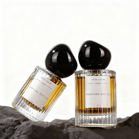 Bouteilles de parfum en verre rondes de luxe personnalisées de 30ml 50ml 100ml Flacon pulvérisateur vide à rayures verticales avec bouchon à bille