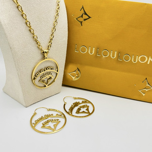Parures <span class=keywords><strong>de</strong></span> <span class=keywords><strong>bijoux</strong></span> <span class=keywords><strong>de</strong></span> mariage <span class=keywords><strong>de</strong></span> luxe pour femmes, colliers et boucles d'oreilles en acier inoxydable plaqué or 18 carats, vente en gros d'usine - Product Image 1
