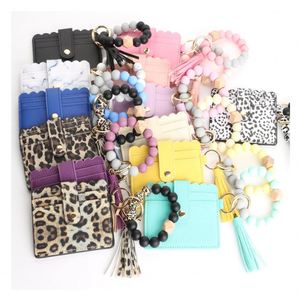 Wholesale Silicone Bead Pu Leather Key Chain Wristlet Id Credit Card <b>Holder</b> Keychain <b>Wallet</b> for Women With Bangle Bracelet - Product Image 1