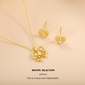 Conjunto de joyería fina con colgante de lazo, collar y pendientes de aleación de cobre con engaste de garras para uso diario - Product Image 1