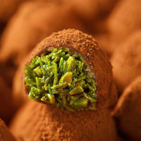 Vente en gros Truffe Chocolat Dubaï Goût sucré Remplissage chocolat au lait Pâte de pistache Chocolat truffe