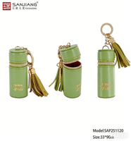 Pochette de rangement cylindrique de luxe avec pompon et porte-clés, mini pochette portable en cuir PU pour usage quotidien