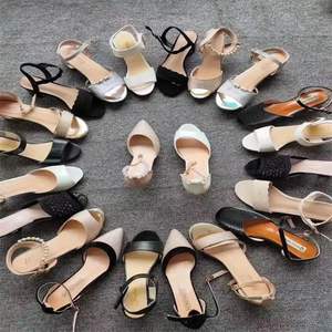 Vente en gros de liquidation, baskets décontractées pour hommes, style de marche, chaussures mixtes pour hommes et femmes, prix en stock, fabriqué en Chine - Product Image 1