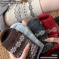 Chaussettes en laine de mouton épaisses et chaudes pour femmes et filles, mode d'hiver, chaussettes rétro à motif de flocons de neige, chaussettes mi-mollet à revers