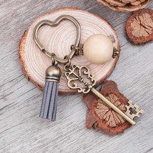 <span class=keywords><strong>Porte</strong></span>-clés coeur en Bronze antique <span class=keywords><strong>Porte</strong></span>-clés Vintage Grandes perles rondes en bois Pendentif Gland Pendentifs <span class=keywords><strong>Porte</strong></span>-clés fait main - Product Image 1