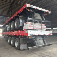 Semi-remorque à plateau plat à 2 essieux de 30 tonnes pour conteneurs de 20 pieds et transport de marchandises locales