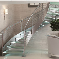 Escaliers intérieurs de luxe en arc avec structure principale en acier au carbone et garde-corps en verre incassable pour usage résidentiel