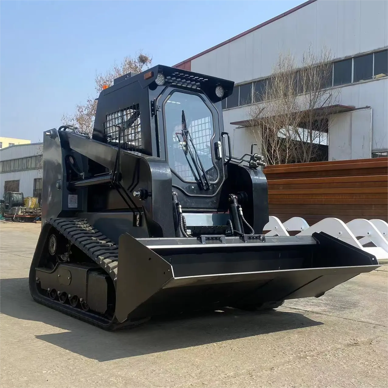 Meilleure qualité ts65 piste skid steer avec chenilles en caoutchouc diesel 100hp skid steer mulching head attachements