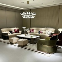 Ensemble de canapés en cuir véritable de style italien, luxe léger, en forme de U, avec design à dossier haut démontable et personnalisable pour l'ameublement de la maison