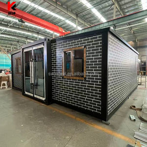 Maison conteneur pliable et extensible en acier préfabriqué, 2 chambres, 1 salle de bain, entièrement meublée, installation rapide et économique, pour usage résidentiel ou bureau. - Product Image 3